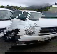 IMAX Private Transfer 7 Guests Cairns Airport to Palm Cove - Accommodation Port Macquarie