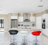 Central Gold Coast Large Modern Elevated Home - Accommodation Port Macquarie