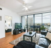 Modern 2 Bedroom River View Apartment in Docklands - Accommodation Port Macquarie